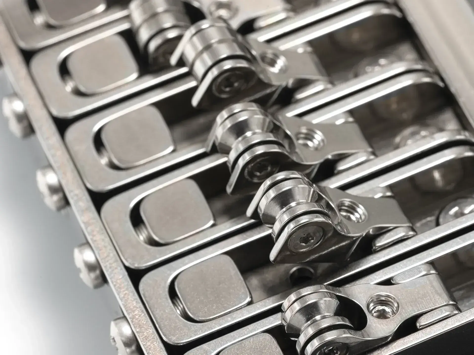 Micro roller saddles with ball bearings